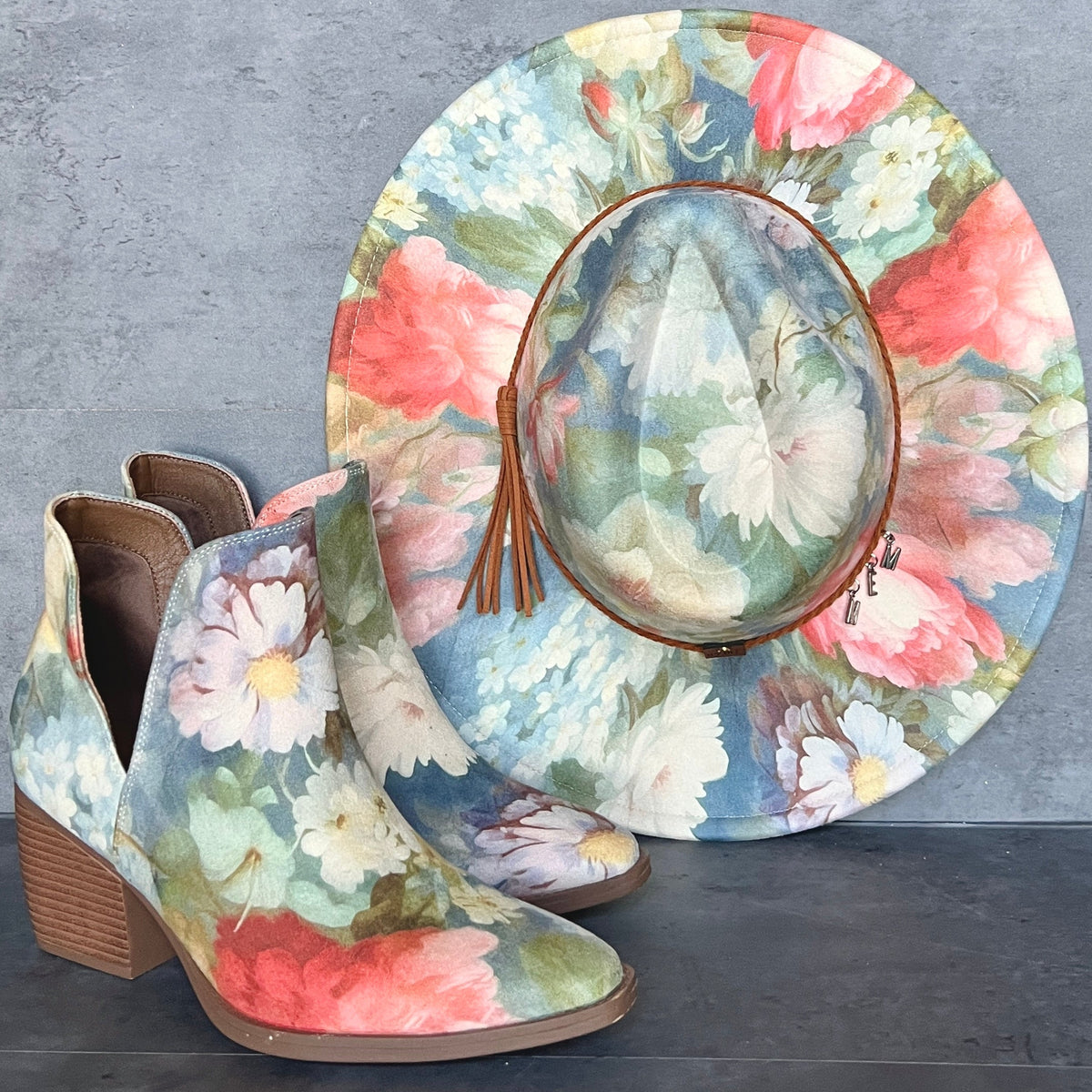 Rococo floral ankle boots and matching Western hat styled together