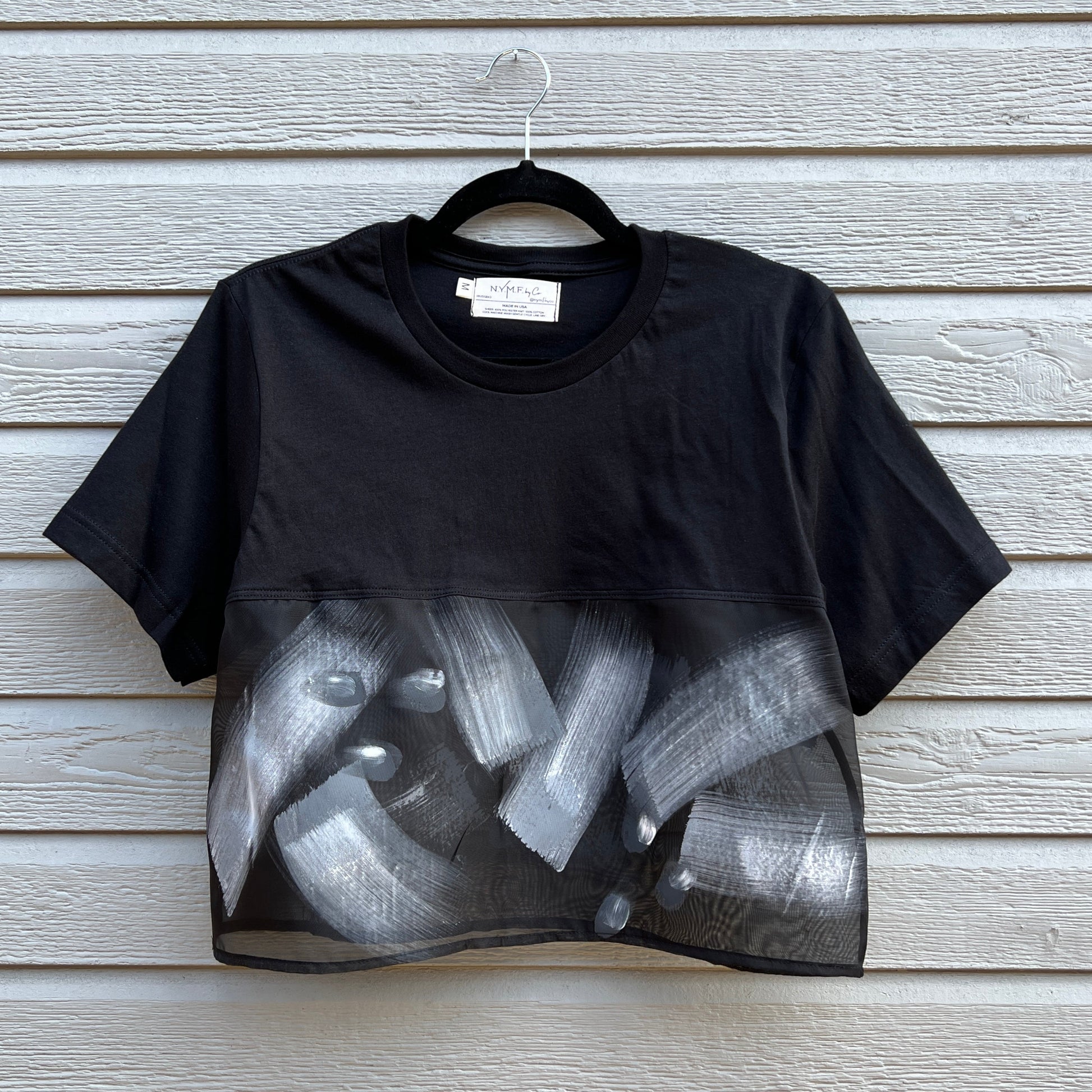 Black sheer sporty crop tee with artwork painted brushstrokes in shades of gray