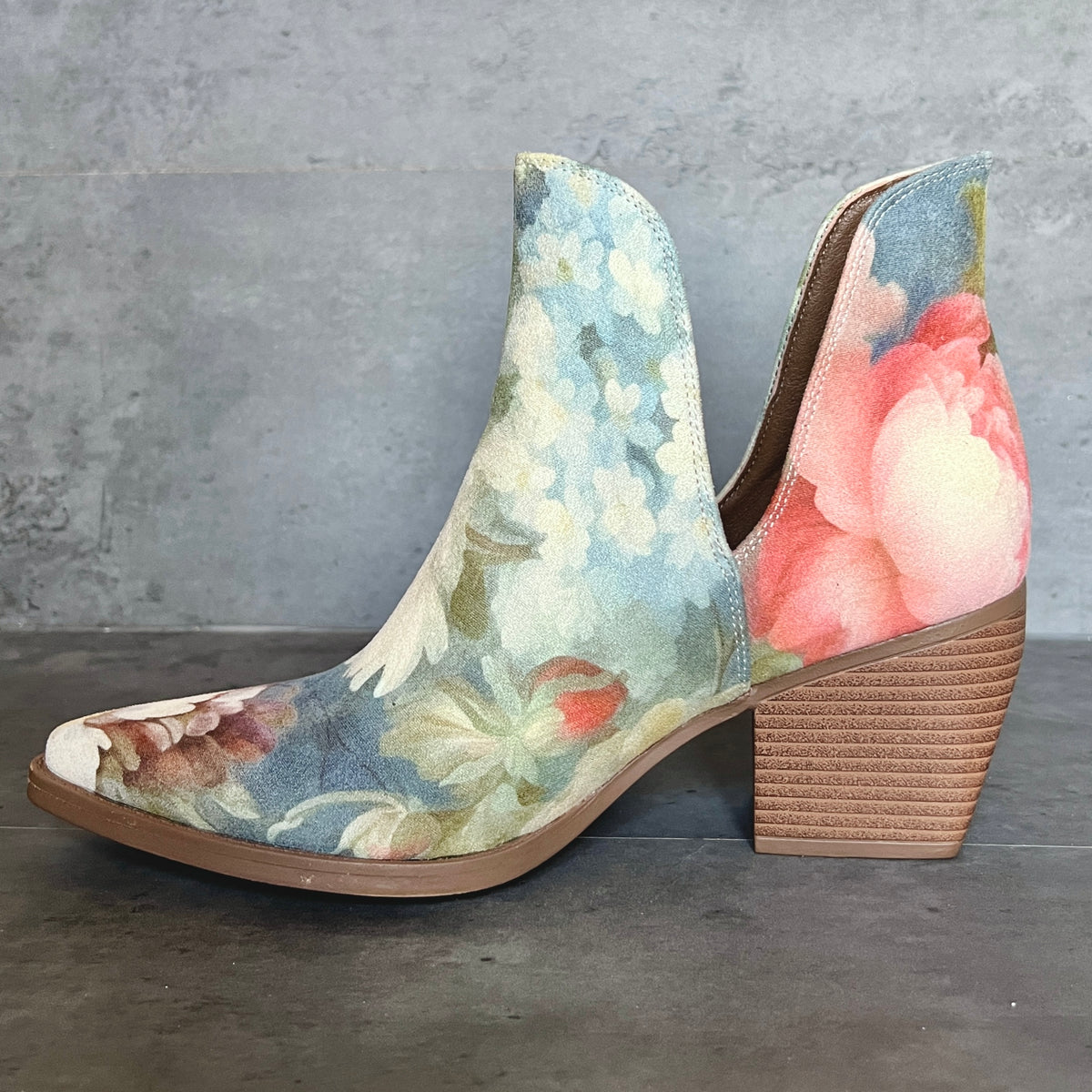 Rococo blue floral suede ankle boot side view with pointed toe and block heel