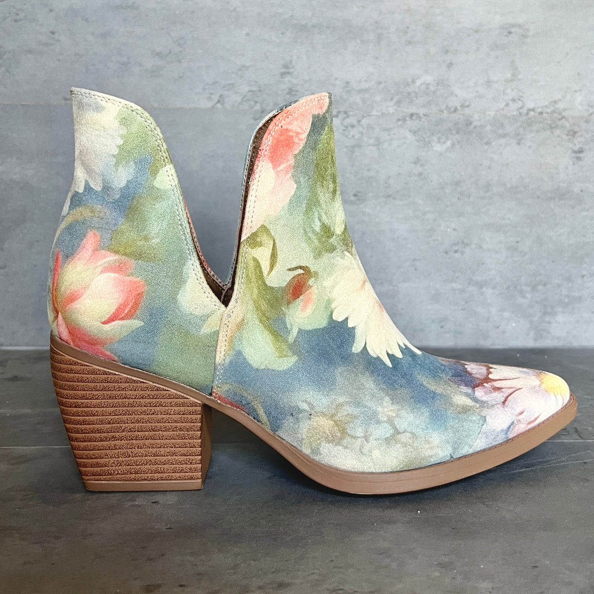 Rococo blue floral suede ankle boot side view with pointed toe and block heel