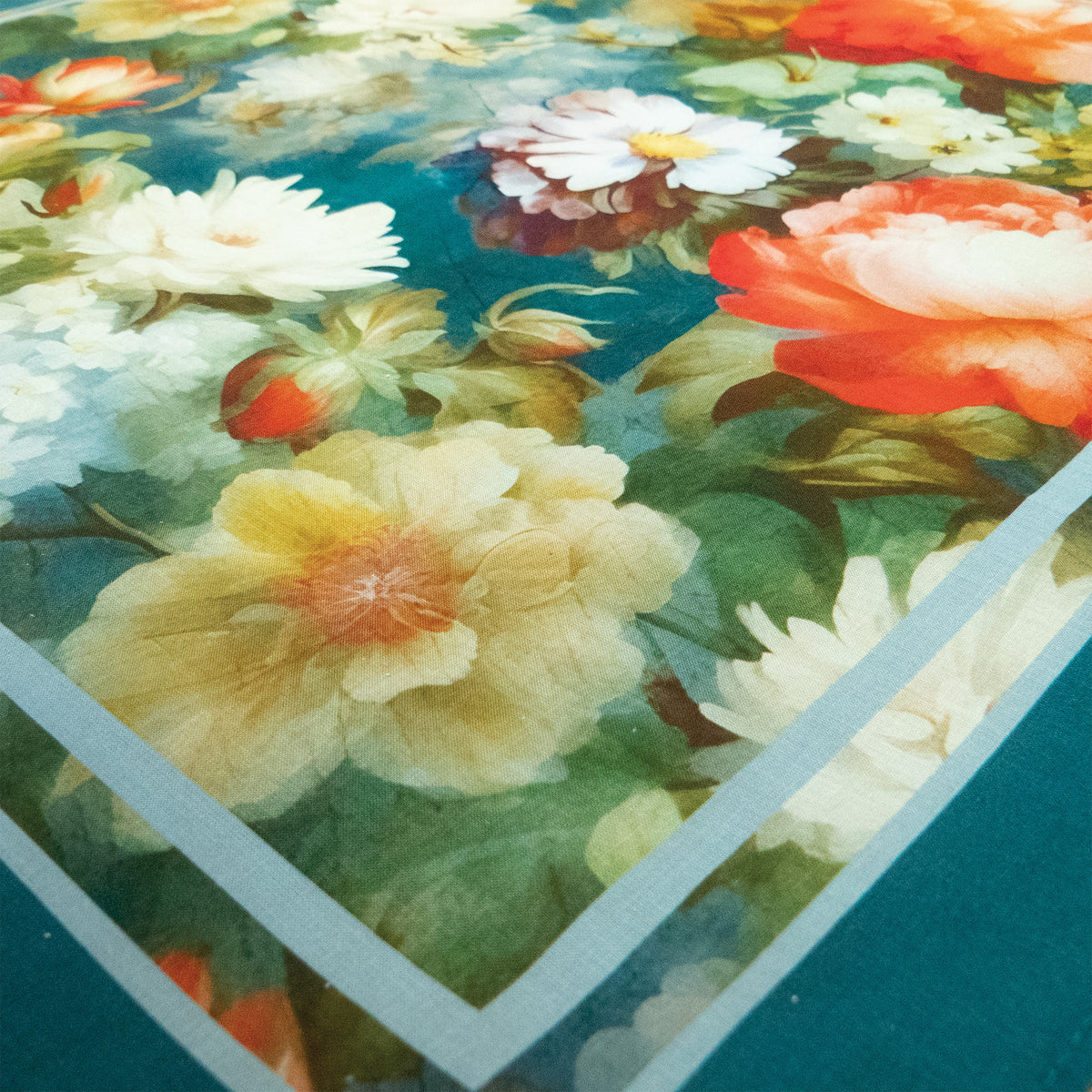Close-up of painterly blue and pink flowers on cotton bandana