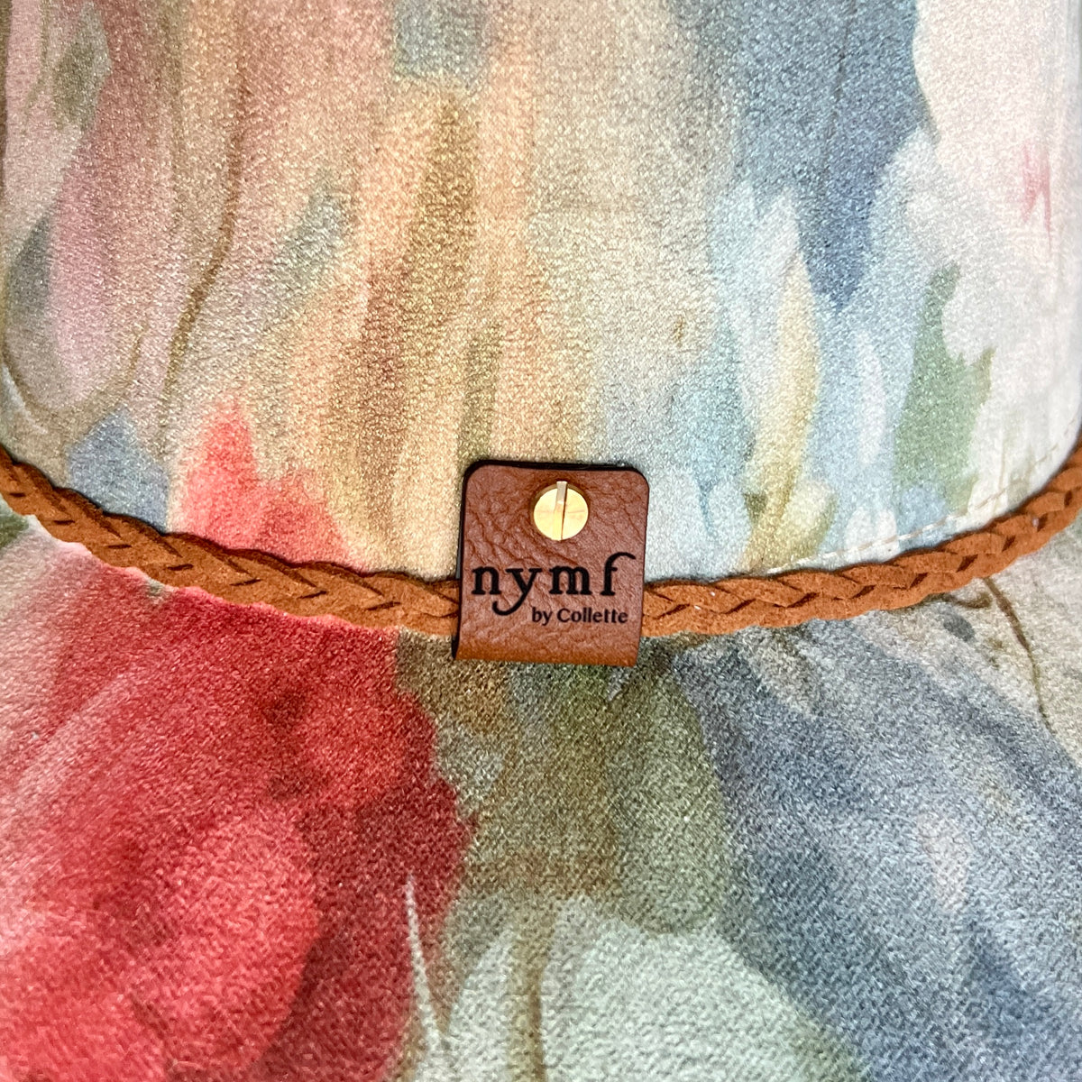 Nymf logo detail on blue floral cattleman cowboy hat