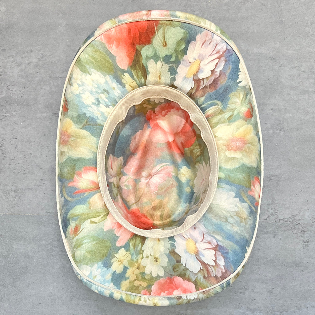 Underside of Rococo blue floral pinched-front cowboy hat