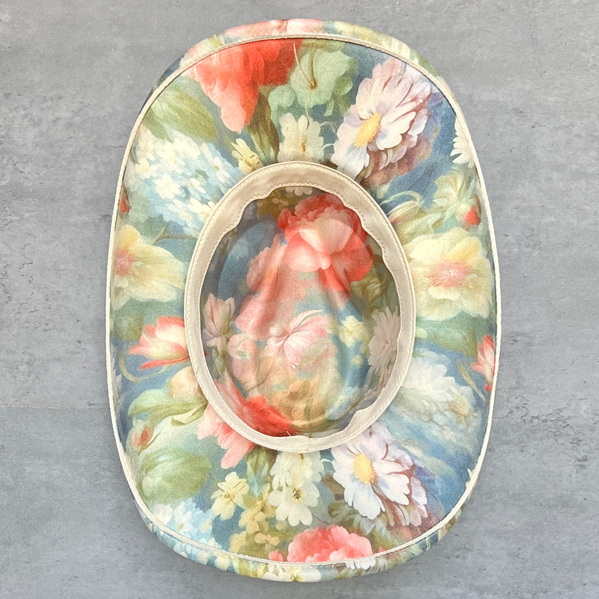 Underside of Rococo blue floral pinched-front cowboy hat