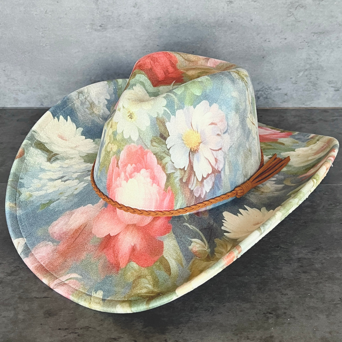 Blue floral pinched-front cowboy hat with braided brown trim