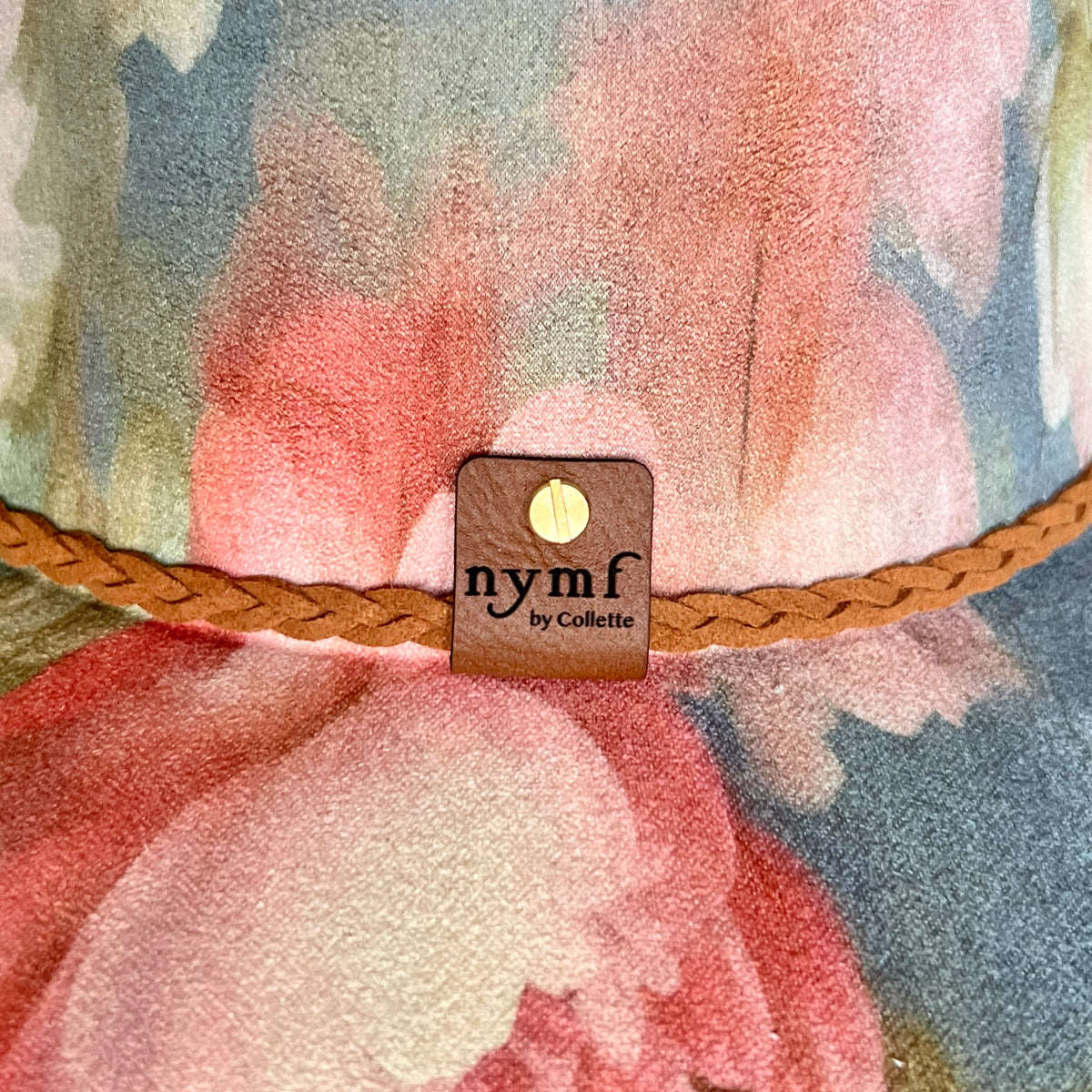 Nymf logo detail on Rococo blue floral cowboy hat