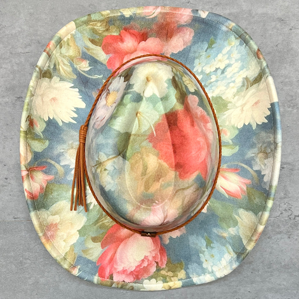 Top view of blue pink and cream floral pinched-front cowboy hat
