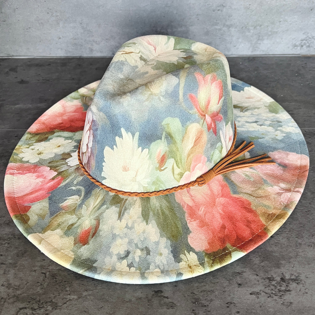 Side view of blue pink and cream floral rancher hat