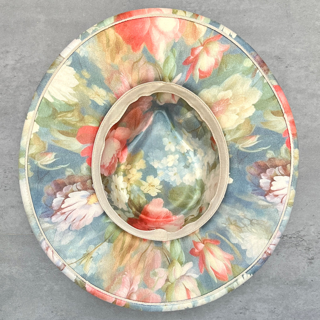 bottom view of Rococo blue floral teardrop rancher hat
